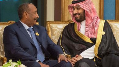 Saudi Arabia's Crown Prince Mohammed bin Salman and Abdul Fattah al-Burhan