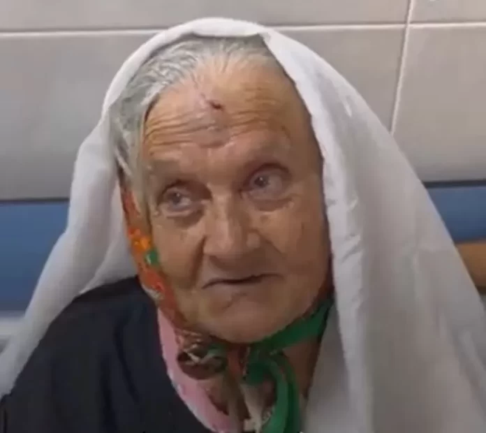 An elderly Palestinian woman born in 1944, which is before the existence of Israel.