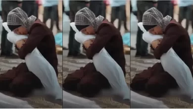 A Palestinian mother kisses the body of her child after he was martyred in an occupation raid