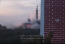 Israeli soldiers bombard a mosque