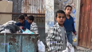 Children searching among piles of garbage