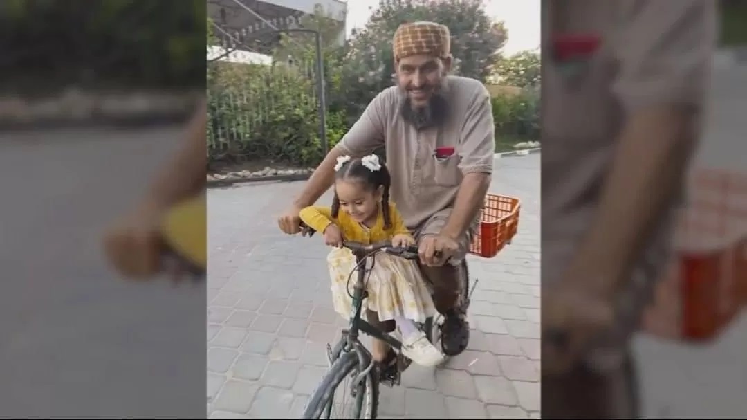 Palestinian Khaled Nabhani, and his granddaughter, the martyr.