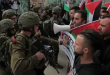 Demonstrators in the West Bank opposing Israeli territorial claims.