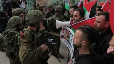 Demonstrators in the West Bank opposing Israeli territorial claims.