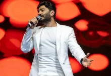 Tamer Hosny performing live on stage during his New Year's concert in Dubai